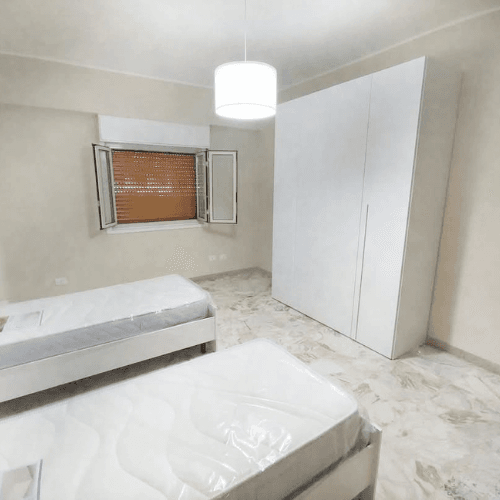 Camera doppia Dimora dello Stretto – Messina vicino Policlinico Oreto Camera doppia con due posti letto nella Dimora dello Stretto vicino Policlinico Oreto a Messina