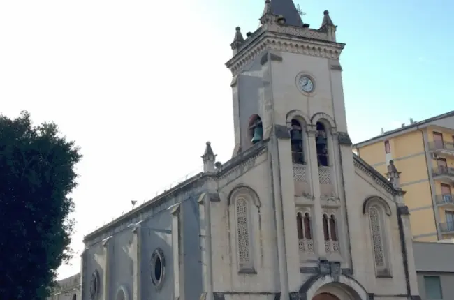 Facciata esterna della Chiesa di Santa Maria della Guardia a Catania,  campanile in stile tardo-barocco