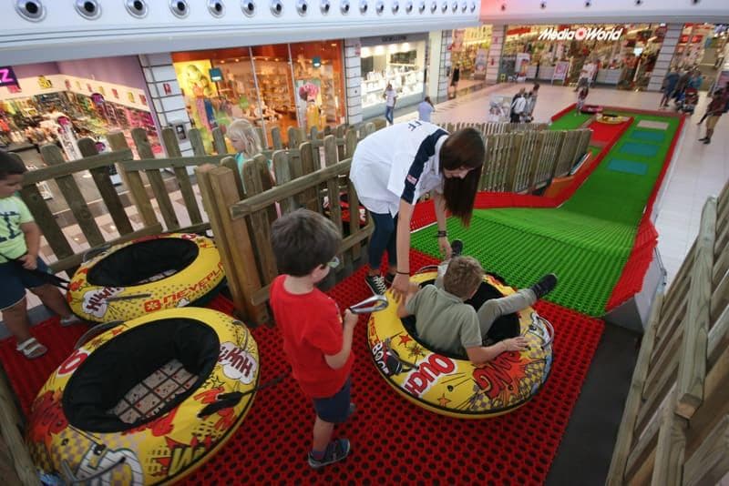 MINI TUBBY tubing ride inside a shopping mall MINI TUBBY tubing ride inside a shopping mall