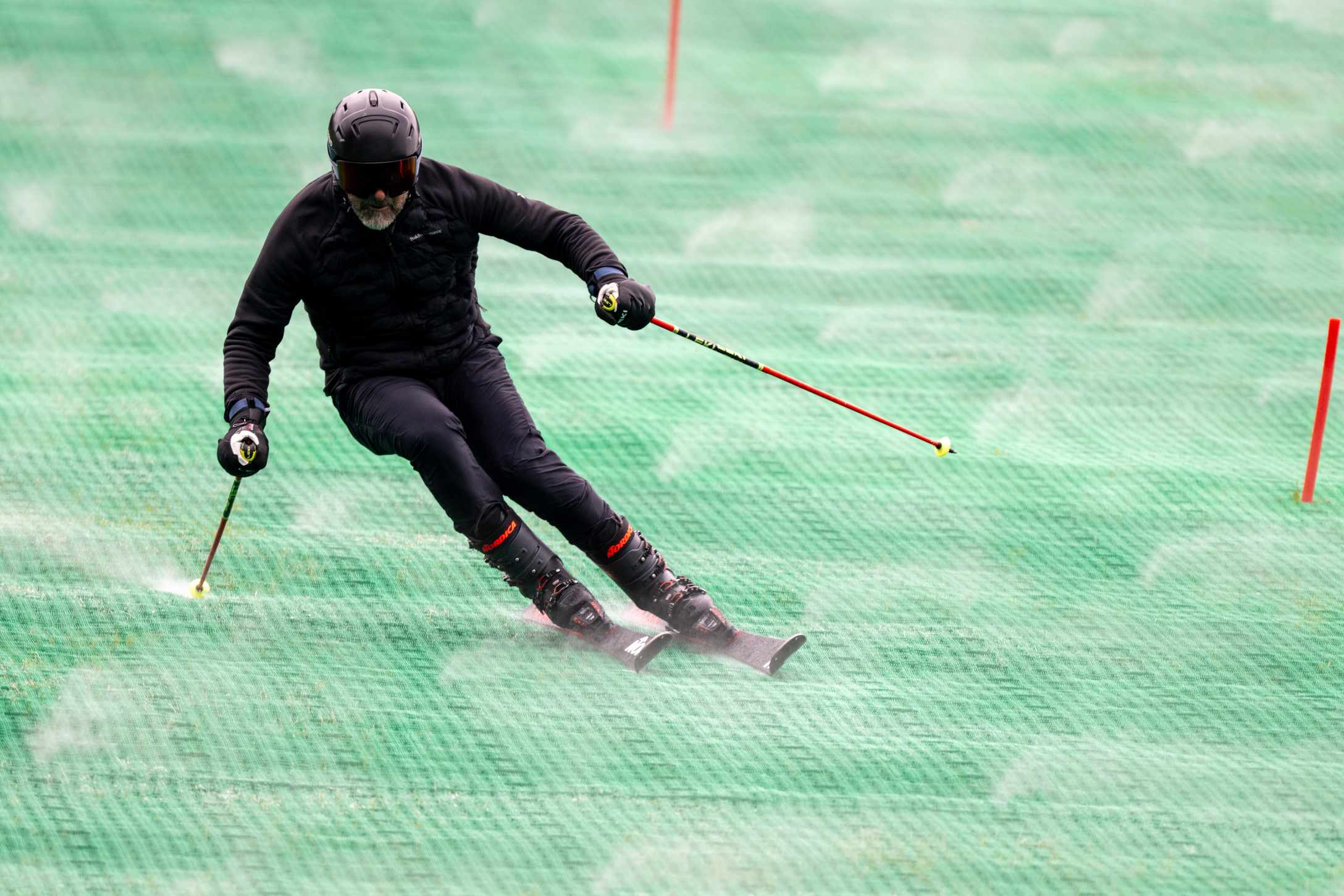 Skier on the Neveplast ski slope at Presolana Ski Arena 365 Skier on the Neveplast ski slope at Presolana Ski Arena 365